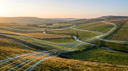 Abstract digital data lines flowing through a tranquil rural landscape at sunrise, symbolizing global network connectivity and modern information technology. © Oktafianto