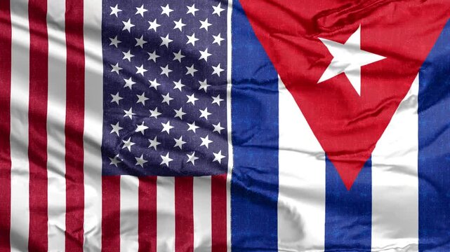  Side-by-side composition of United States and Cuba flags with a wrinkled fabric texture symbolizing diplomatic relations.