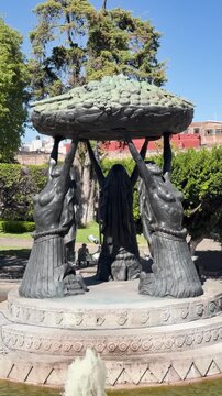 Vertical view of Tarascas Fountain sculpture in Morelia, iconic landmark in Michoacan, Mexico