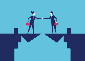 A business man and woman in suits shake hands across a broken bridge signifying connection.