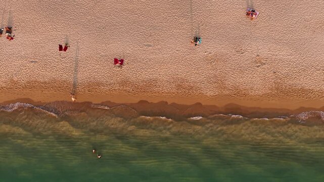 Breathtaking aerial drone video of Long Beach, Koh Lanta Island, capturing tranquil turquoise waters and golden sands from above