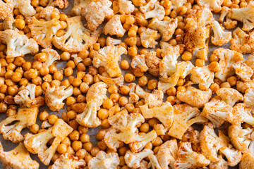 Seasoned Raw Cauliflower Florets and Chickpeas in Tray Ready for Roasting