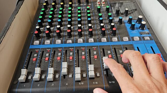 Jakarta, Indonesia - 24th January 2026 - Professional analog audio mixing console featuring multiple channels with faders, knobs, and EQ controls for high-quality sound reinforcement, music production