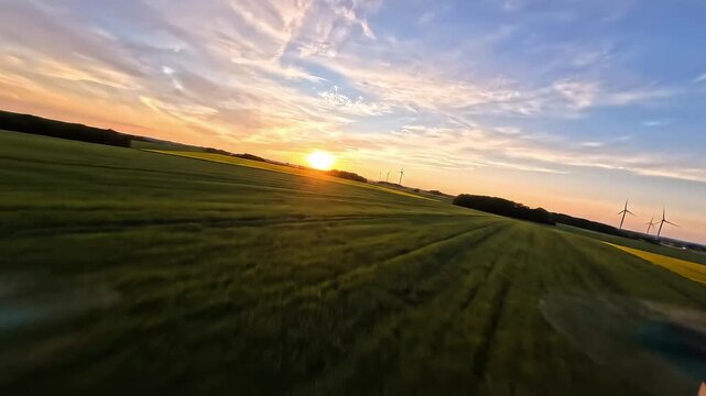 Drone shot of endless farm fields fading into horizon