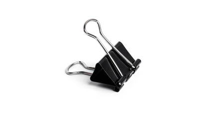 Black metal binder clips on white background. High quality photo