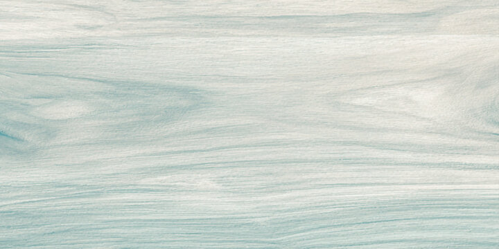 soft pastel blue wood texture background featuring natural flowing grain patterns for coastal themed designs