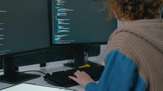 Focused professional software engineer working on laptop and agentic terminal coding in a modern office. Concept of SaaS,agentic workflow,enterprise software development and reinventing tech.
