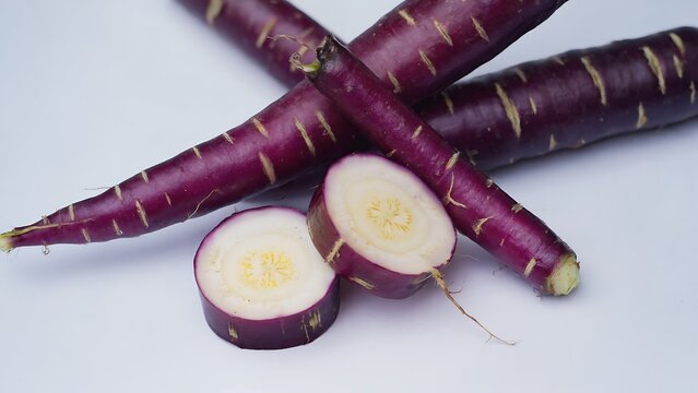 Purple Dragon Carrots on White