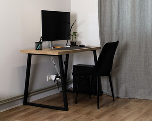 Full view of a modern minimalist home office setup. Clean and productive workspace interior. Freelance life. Workplace organization