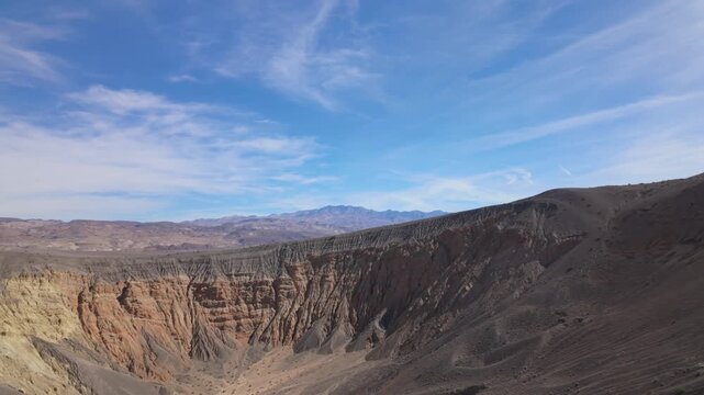 Gimbal close-up booming down shot of Ubehebe Crater in Death Valley, California. 4K