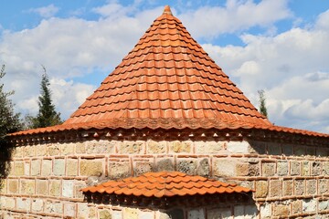 Traditional Red Tiled Conical Roof 