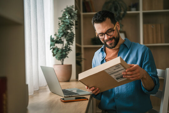 Man receiving package for home online shopping delivery