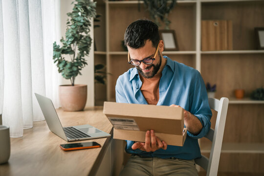 Man receiving package for home online shopping delivery