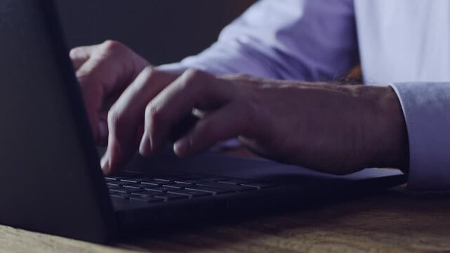Business man hands close up typing on a computer. Business strategy building for success. Digital content creation