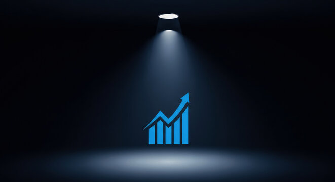 A blue graph highlighted by a spotlight in a dark room