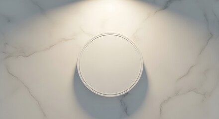 A white marble surface with a circular object casting a shadow.