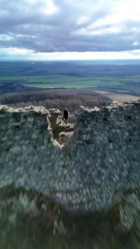 Aerial drone flyover of medieval castle ruins landscape