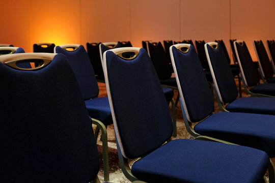 Empty seats before a conference session