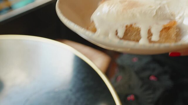 Delicious kataifi dessert with cream on a stylish plate, looking appetizing