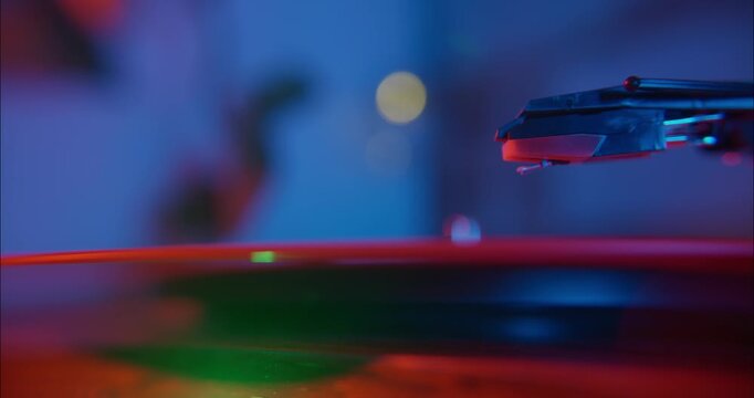 Macro shot of a turntable playing a vinyl record