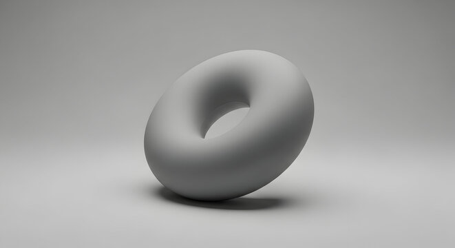 Gray matte torus shape on neutral background toroidal