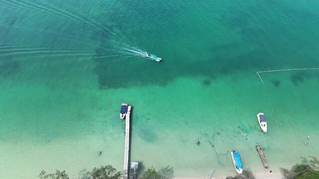 Starfish Beach (Rach Vem), Phu Quoc Island, An Giang (Kien Giang), Vietnam &ndash; 4k aerial drone footage of tropical beaches, turquoise water, white sand beach, wooden pier, fishing boats, coastal forest