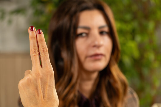 Therapist guiding EMDR eye movements using finger motion. Highlights visual attention, rhythmic pacing, and trauma-focused treatment.