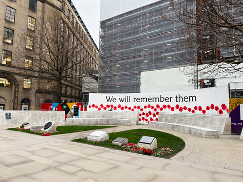 We will remember them: poppies at a Manchester memorial near a construction site