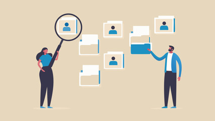 Team members collaborating on digital profiles and data analysis