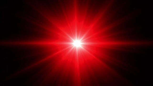 Vibrant red light burst on dark background for dramatic effect