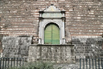 Traditional Marble-Carved Door Frame, Close-up of Historic Stone Wall with Ornate Door