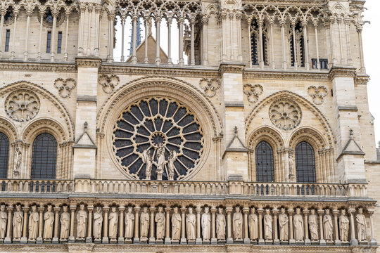 Gothic rose window in Paris France Cathedral of Notre Dame de Paris. Old building French architecture facade. Round detail