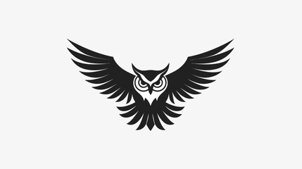 Fototapeta premium Black and white owl silhouette with outspread wings against white background