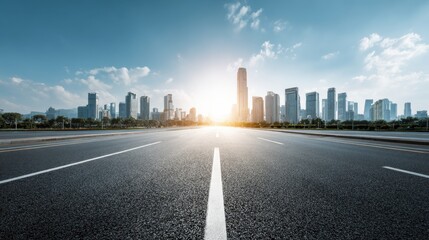 Obraz premium Urban Skyline at Sunrise with Clear Road and Blue Sky Above Cityscape in Morning Light