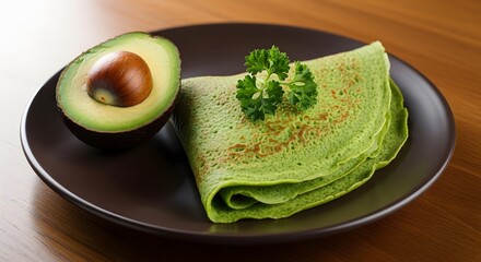Fresh Avocado and Green Crepes Garnished with Parsley on a Dark Brown Plate