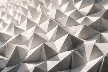 Fototapeta premium Abstract geometric texture featuring layered paper pyramid shapes