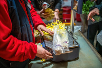 People Selling Fresh Vegetables at Market Stall