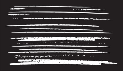 A set of distressed white chalk lines with varied textures and grit, displayed on a dark background for an authentic chalkboard effect. © Mend