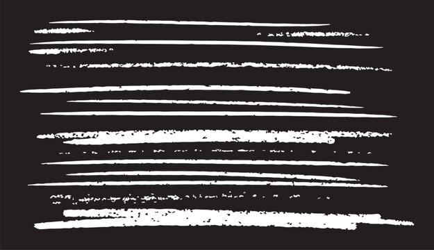 A set of distressed white chalk lines with varied textures and grit, displayed on a dark background for an authentic chalkboard effect.