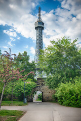 Petrin lookout tower rising above trees in Prague, Czech Republic