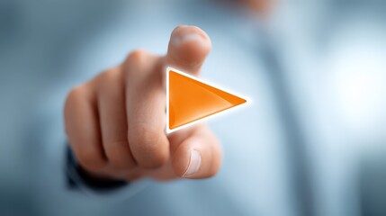 A hand pushing button on a touch screen interface.