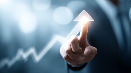 A businessman is pressing and pointing his finger at a glowing, translucent upward graph arrow.