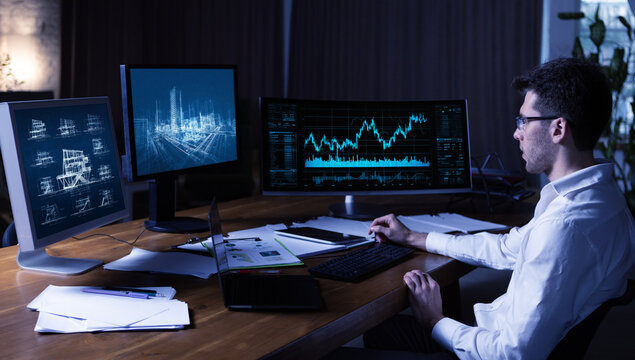 Futuristic artwork. Business analyst working with financial dashboards and city architecture on multiple screens. Concept of digital business analytics, investment planning and data driven decisions.