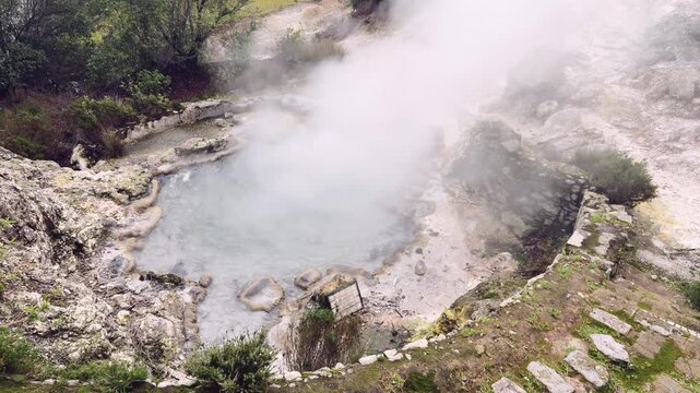 Steaming geothermal pool at Caldeira Asmodeu in Furnas Sao Miguel Azores Portugal
