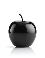 Obraz premium Glossy Black Apple Still Life on White Background.