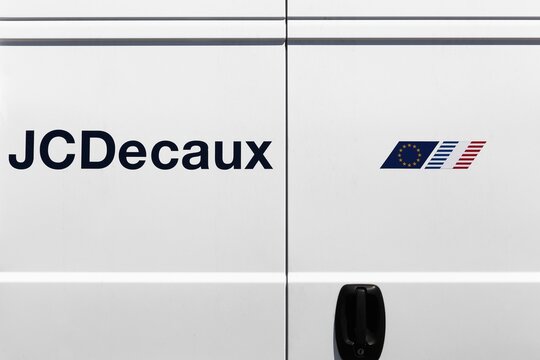 Decines, France - June 13, 2019: JCDecaux is a multinational corporation based in France, known for its bus-stop advertising systems, billboards, public bicycle rental systems, and street furniture