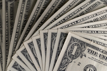 Macro View of Stacked One US Dollar Bills with Focus on George Washington Portrait