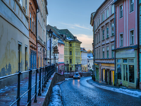 Banska Stiavnica Cobblestone Street with Historic Colorful Buildings at Sunset