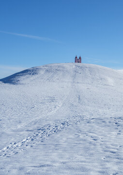 Banska Stiavnica Calvary Church On Snowy Winter Hill Under Blue Sky Slovakia
