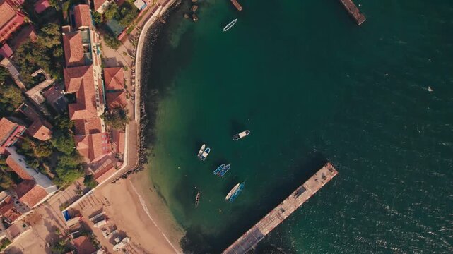 Aerial view of Gor&eacute;e Island, a UNESCO World Heritage site, is magical during the day with a magical sunset